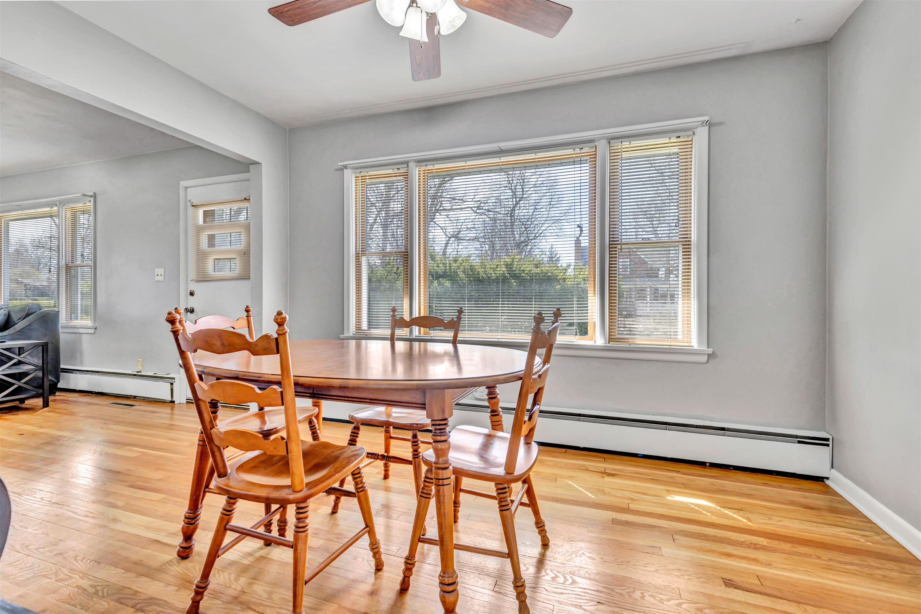 3620 Highcrest Road Rockford, IL 61107 - Photo 6 of 18 a dining room with furniture and wooden floor