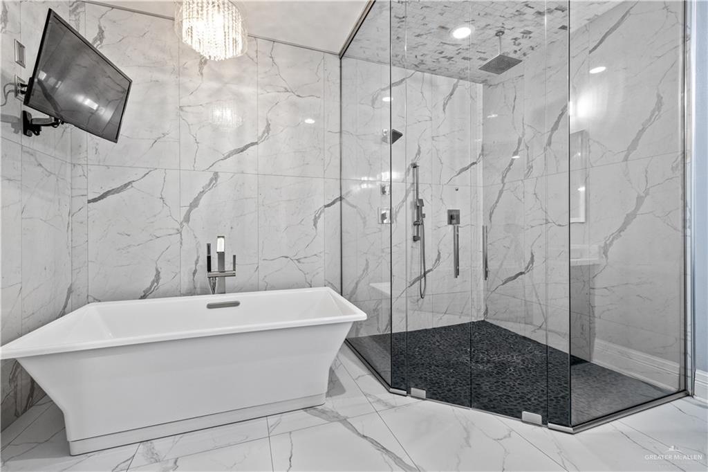 2012 North 46th Street McAllen, TX 78501 - Photo 14 of 41 a bathroom with a sink a toilet and shower