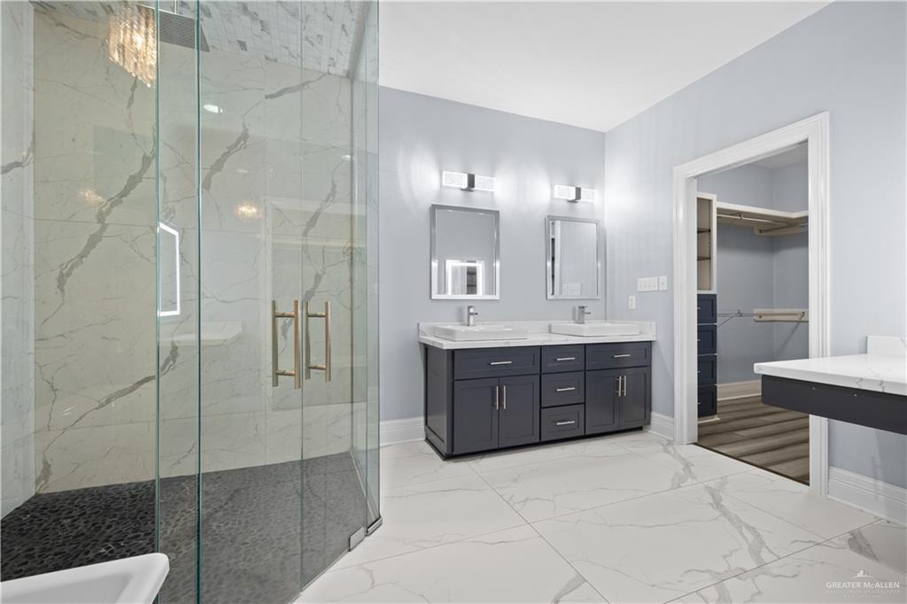 2012 North 46th Street McAllen, TX 78501 - Photo 15 of 41 a bathroom with a sink a toilet and shower