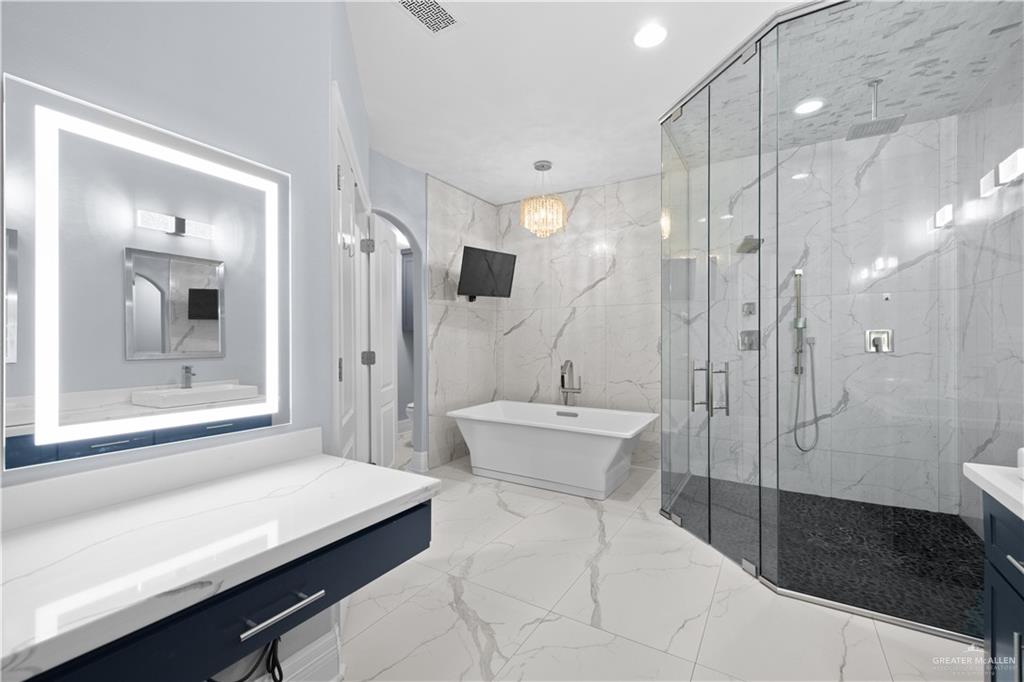 2012 North 46th Street McAllen, TX 78501 - Photo 16 of 41 a bathroom with a sink a toilet and shower