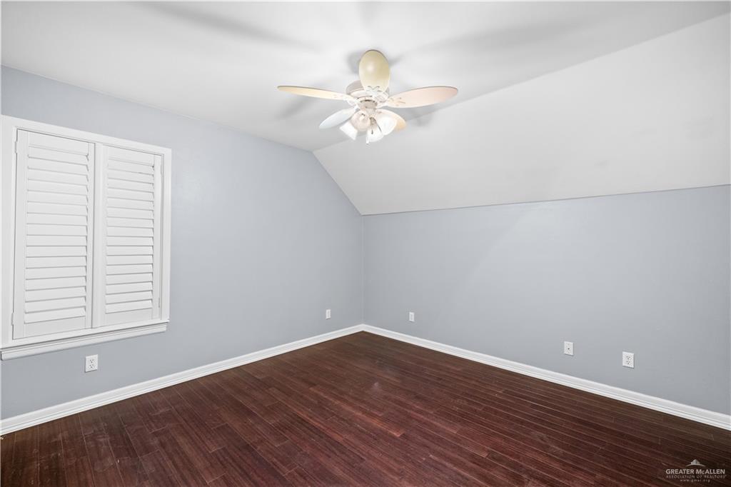 2012 North 46th Street McAllen, TX 78501 - Photo 28 of 41 wooden floor in an empty room with a window