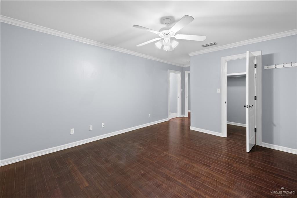 2012 North 46th Street McAllen, TX 78501 - Photo 29 of 41 a view of an empty room with wooden floor