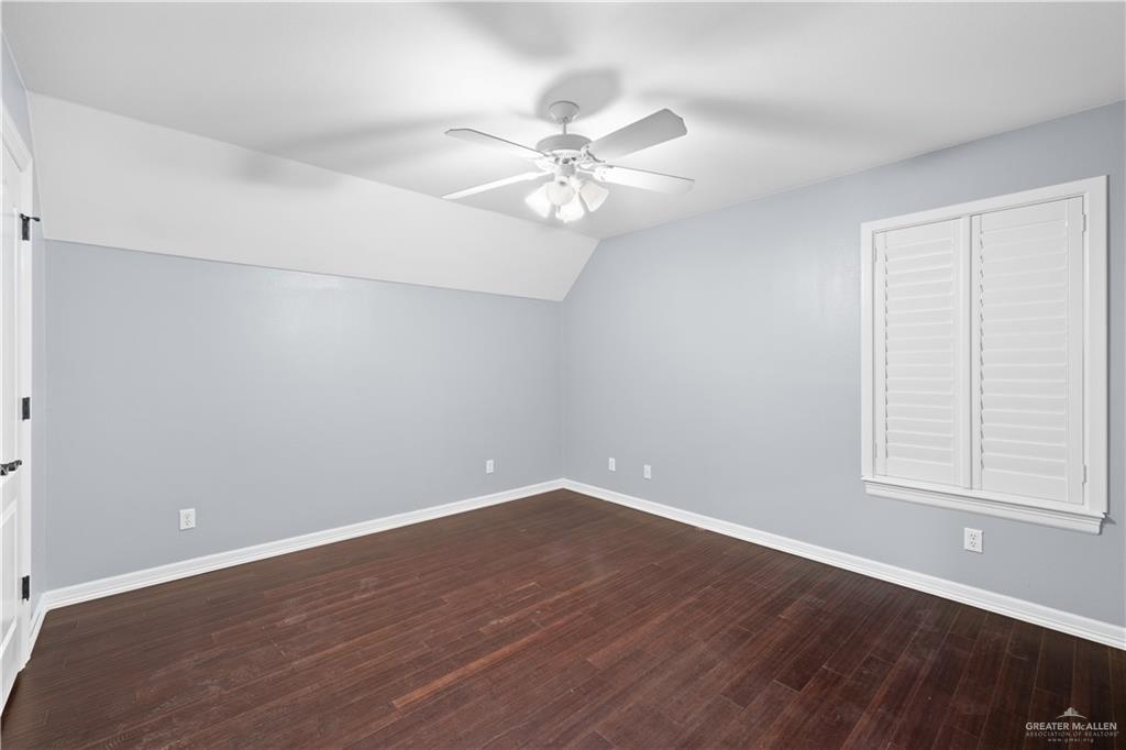 2012 North 46th Street McAllen, TX 78501 - Photo 36 of 41 wooden floor in an empty room with a window