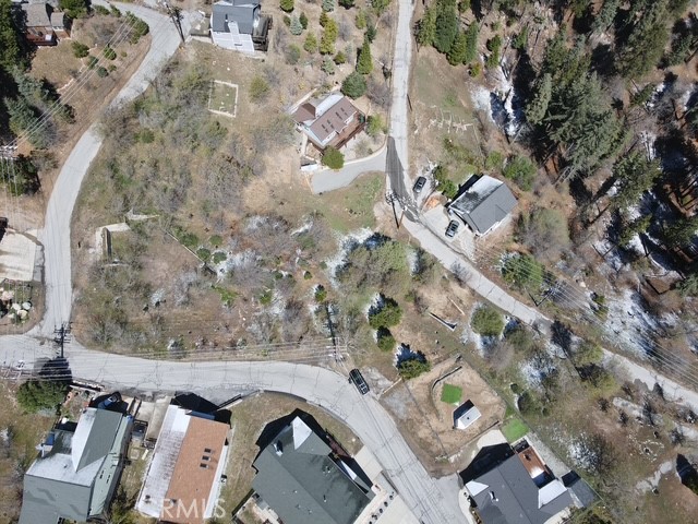 31912 Encina Way Running Springs, CA 92382 - Photo 4 of 6 an aerial view of a house with a yard