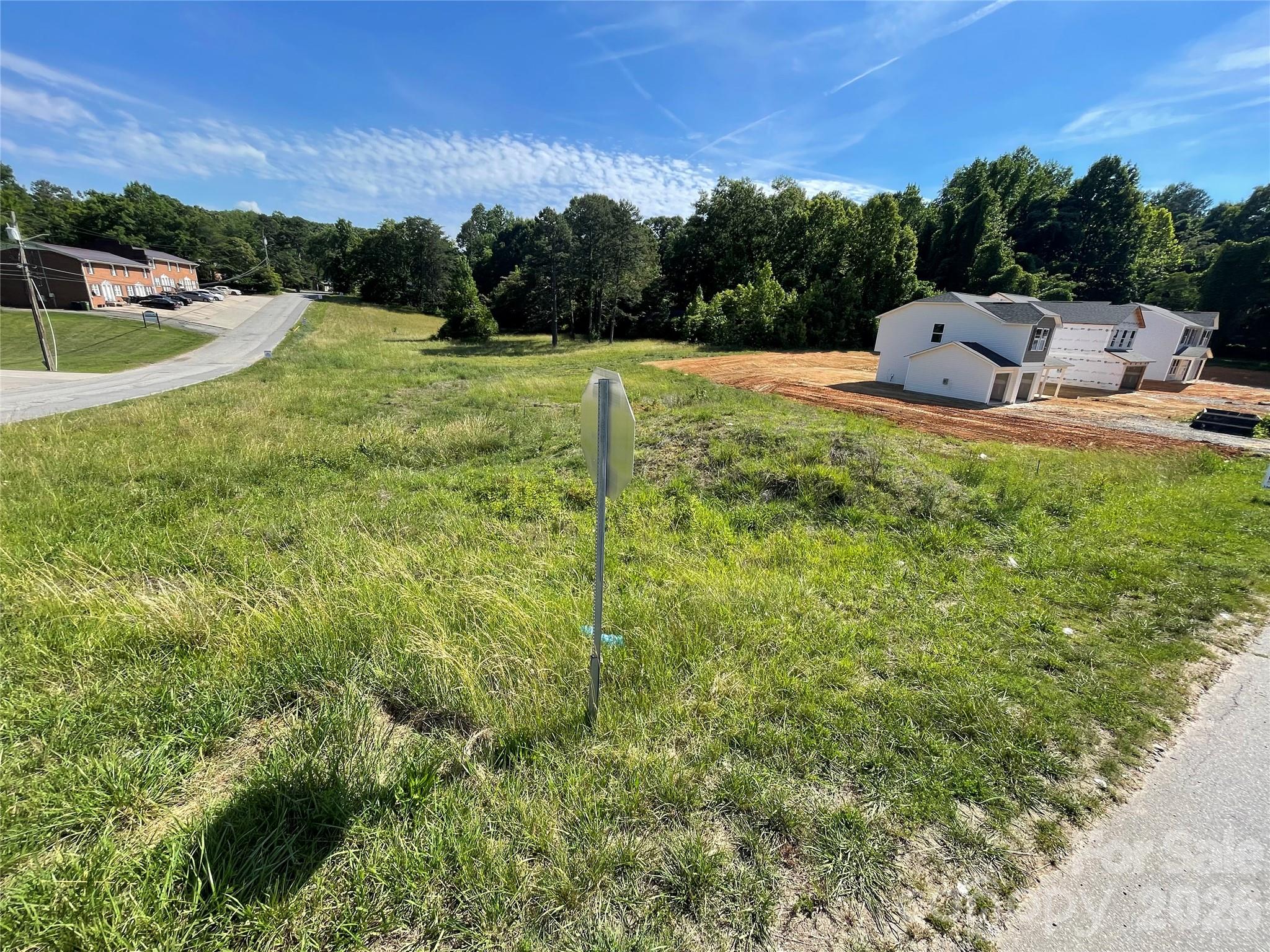 108 Longview Street Lexington, NC 27295 - Photo 1 of 1 a view of a grassy area with an trees