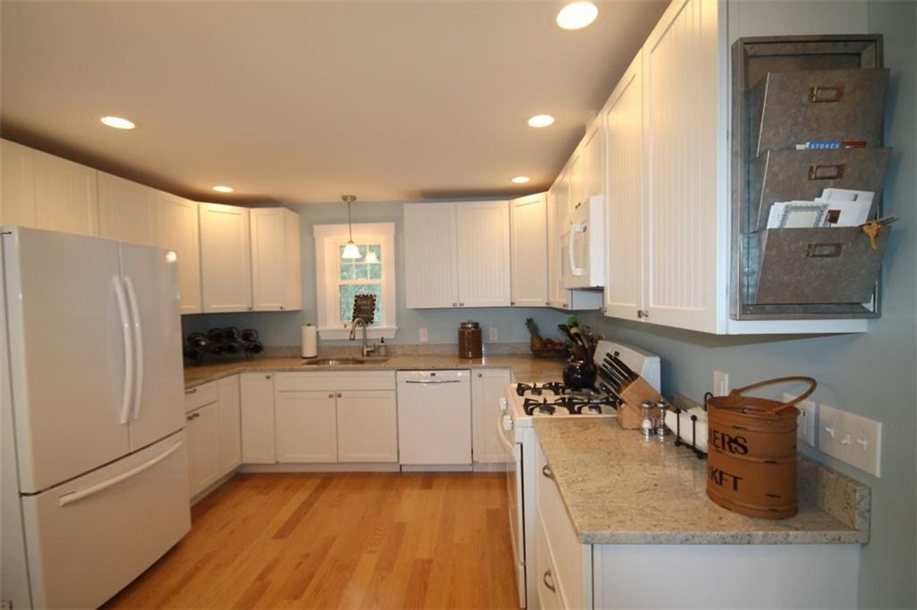 8 Meadow Cove Road East Boothbay, ME 04544 - Photo 10 of 25 The eat-in kitchen with white...