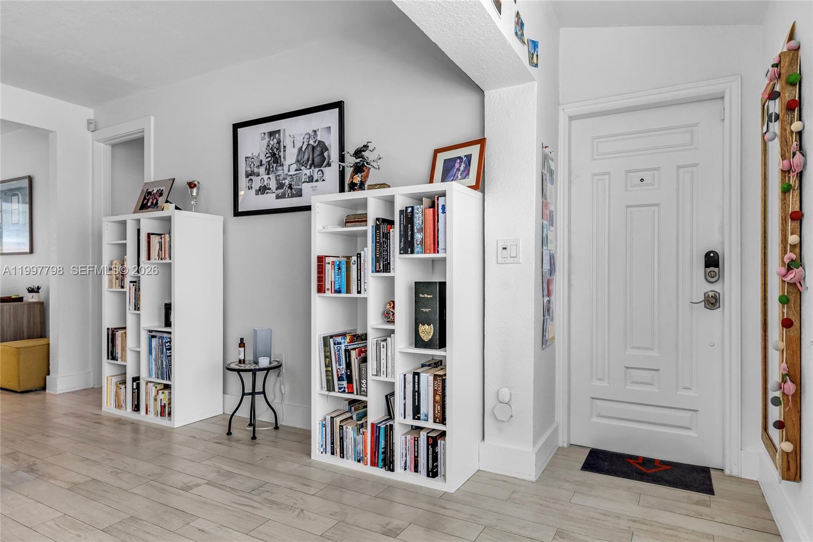 4371 Southwest 13th Terrace Miami, FL 33134 - Photo 11 of 48 a view of a bedroom with wooden floor and closet
