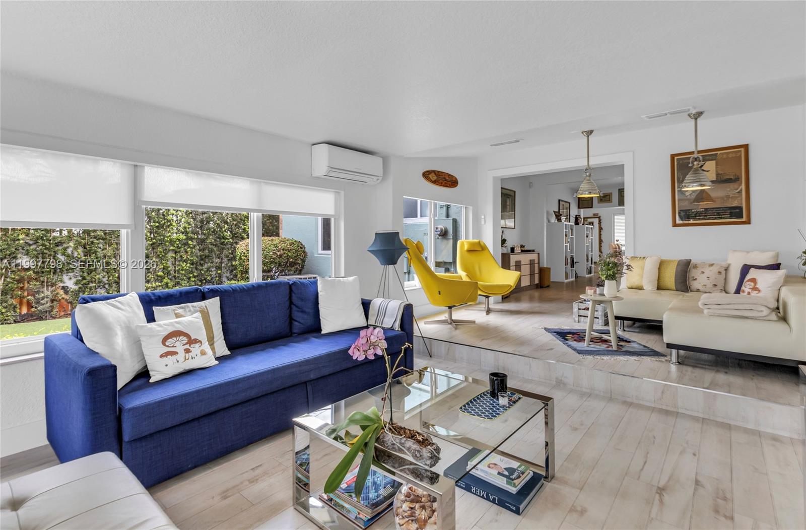 4371 Southwest 13th Terrace Miami, FL 33134 - Photo 22 of 48 a living room with furniture and wooden floor