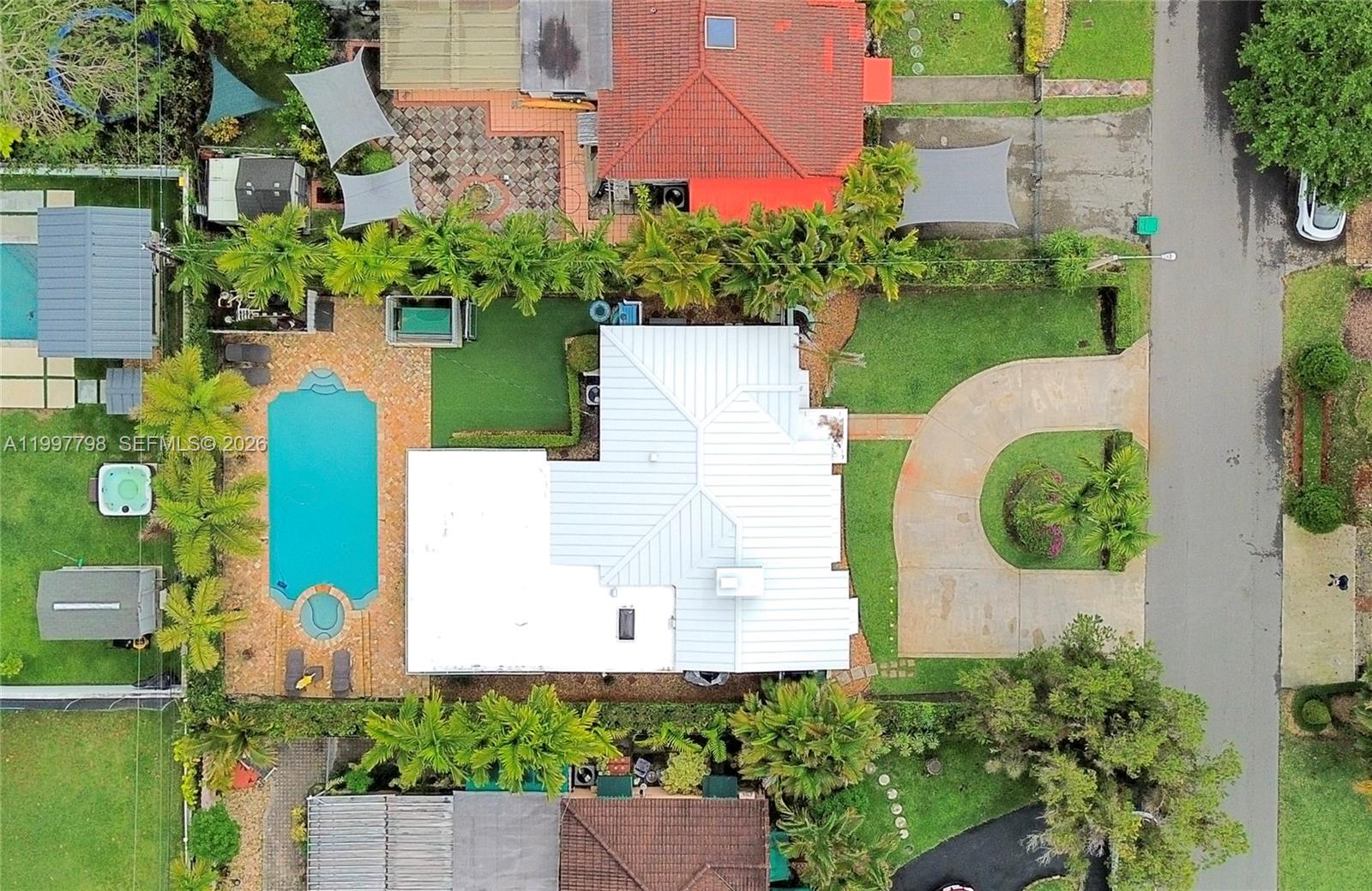 4371 Southwest 13th Terrace Miami, FL 33134 - Photo 42 of 48 an aerial view of a house with yard swimming pool and outdoor seating