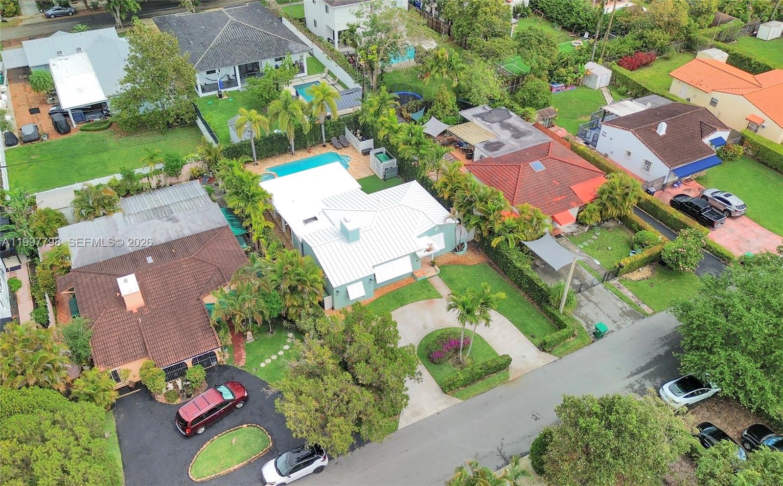 4371 Southwest 13th Terrace Miami, FL 33134 - Photo 44 of 48 an aerial view of multiple houses with yard