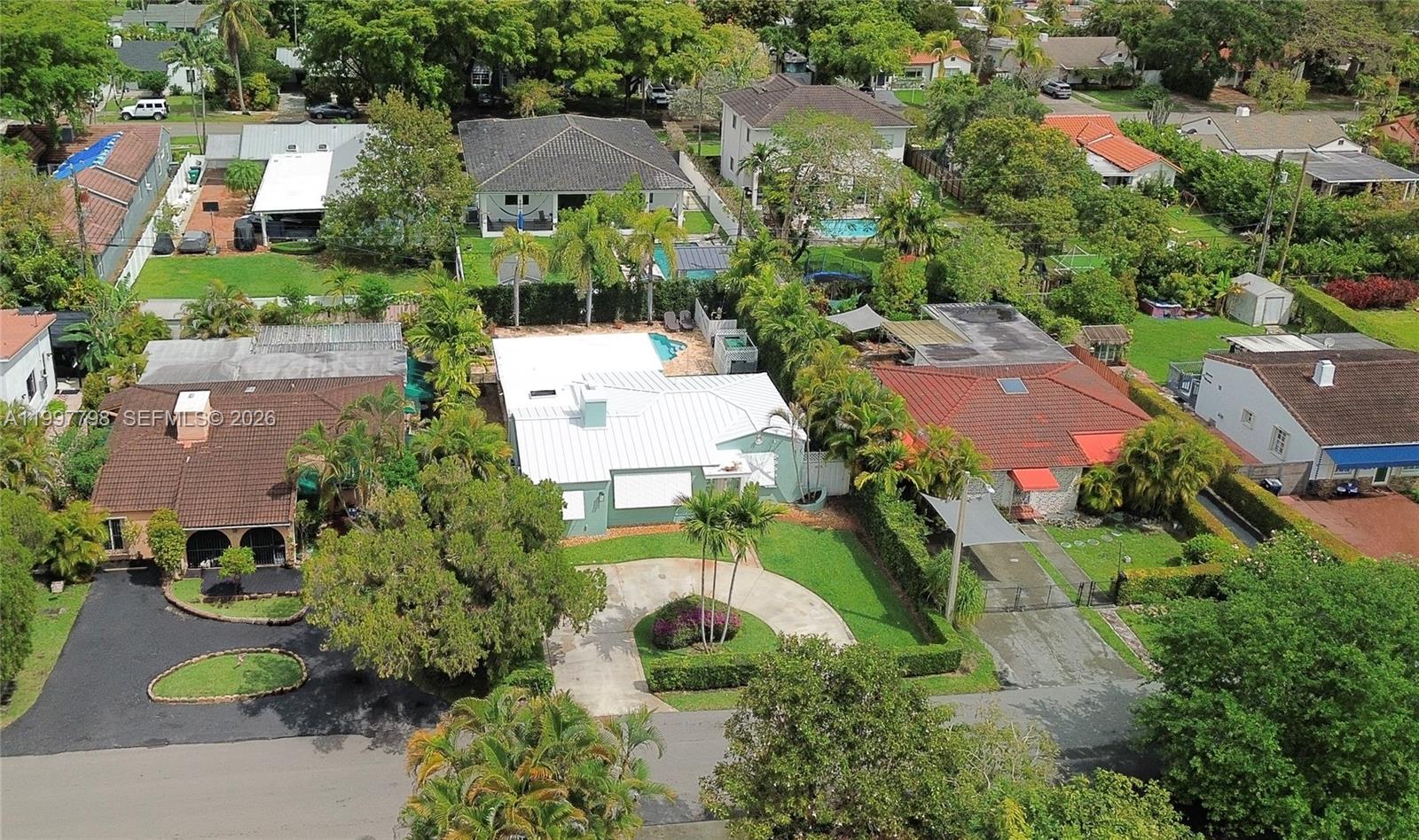 4371 Southwest 13th Terrace Miami, FL 33134 - Photo 45 of 48 an aerial view of a house with yard swimming pool and outdoor seating