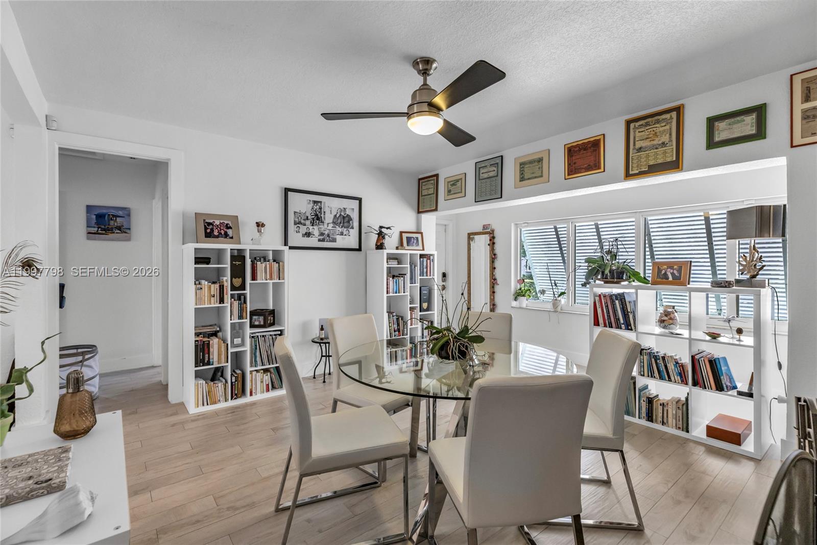 4371 Southwest 13th Terrace Miami, FL 33134 - Photo 9 of 48 a dining room with furniture and wooden floor