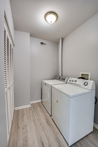 3379 Kentshire Circle, Unit 3379 Aurora, IL 60504 - Photo 17 of 17 a utility room with dryer and washer