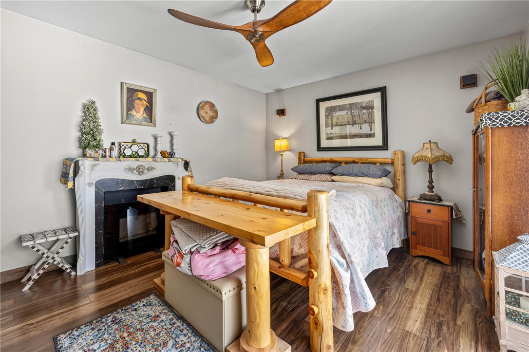 998 Pinewood Road Phelps, NY 14532 - Photo 15 of 39 Primary room with slider out to back lawn.