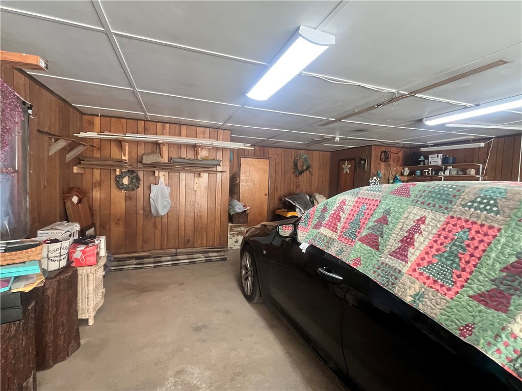 998 Pinewood Road Phelps, NY 14532 - Photo 37 of 39 Large two car garage with utilities.