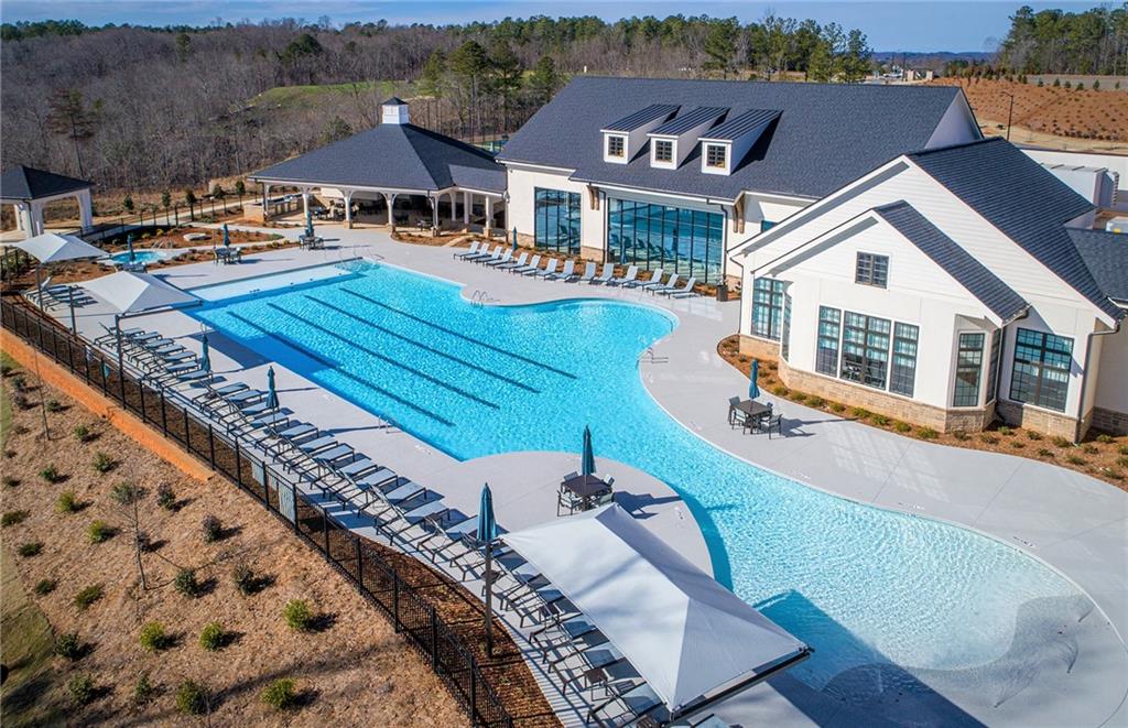 2426 Naples Street Hoschton, GA 30548 - Photo 4 of 11 an aerial view of a house with swimming pool