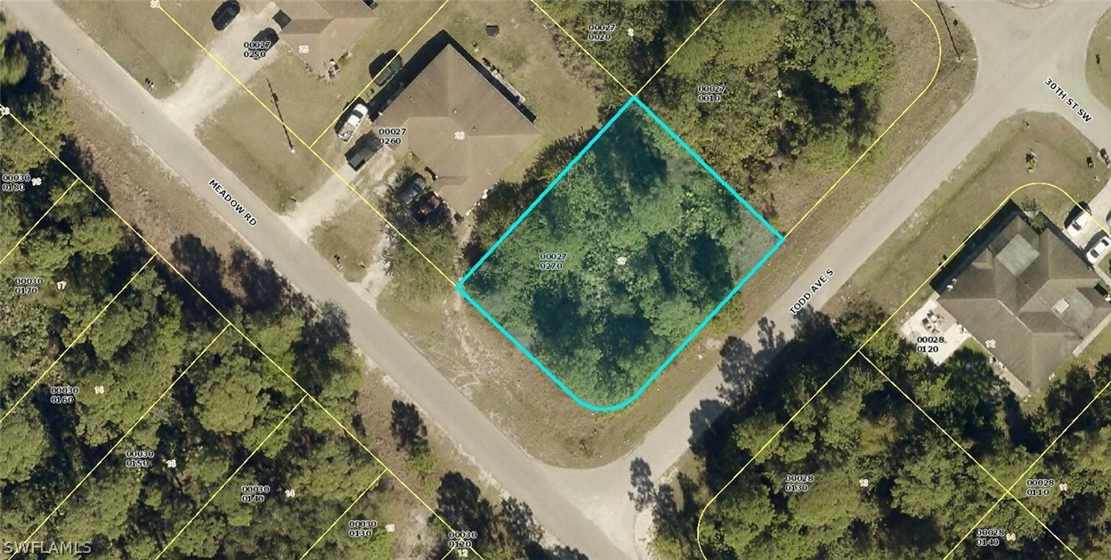 149-151 Meadow Road Lehigh Acres, FL 33973 - Photo 1 of 8 an aerial view of a house