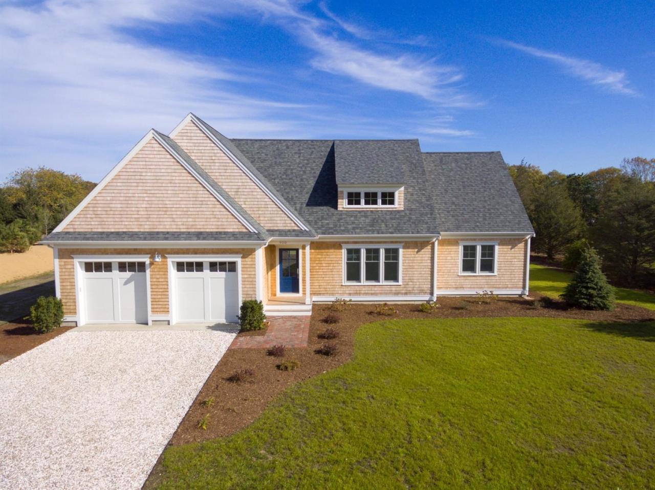 900 Massasoit Road Eastham, MA 02642 - Photo 21 of 21 front view of a house with a yard
