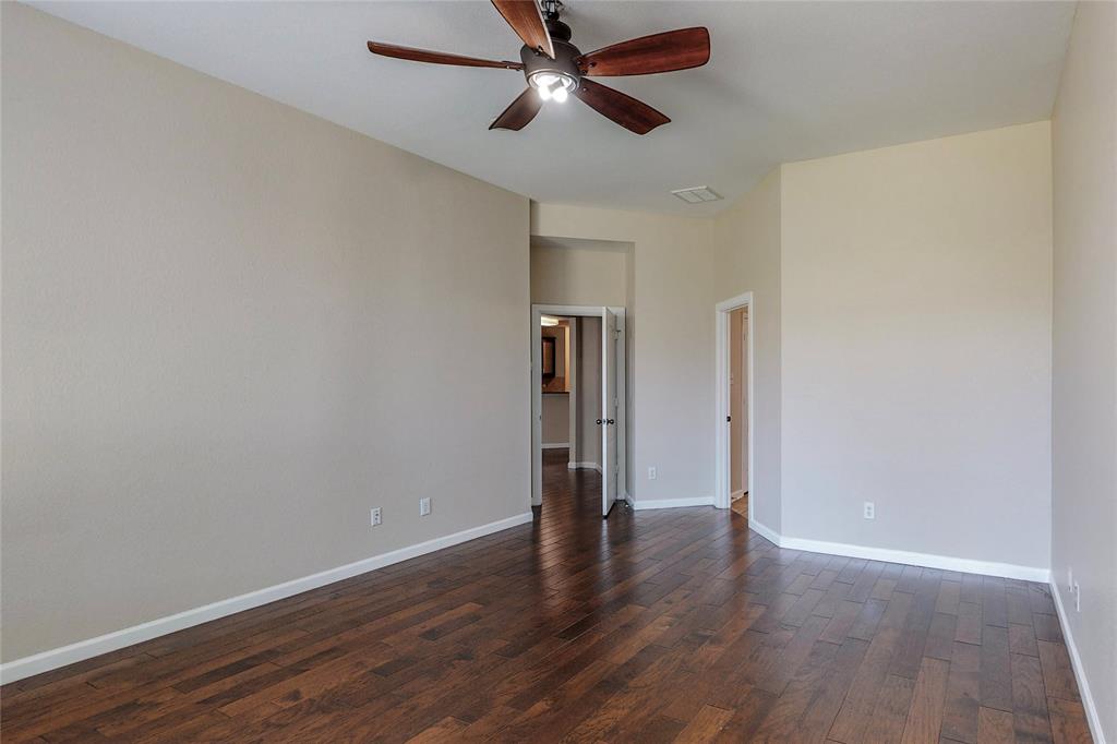 2855 Coteau Way Dallas, TX 75227 - Photo 14 of 35 a view of empty room with wooden floor