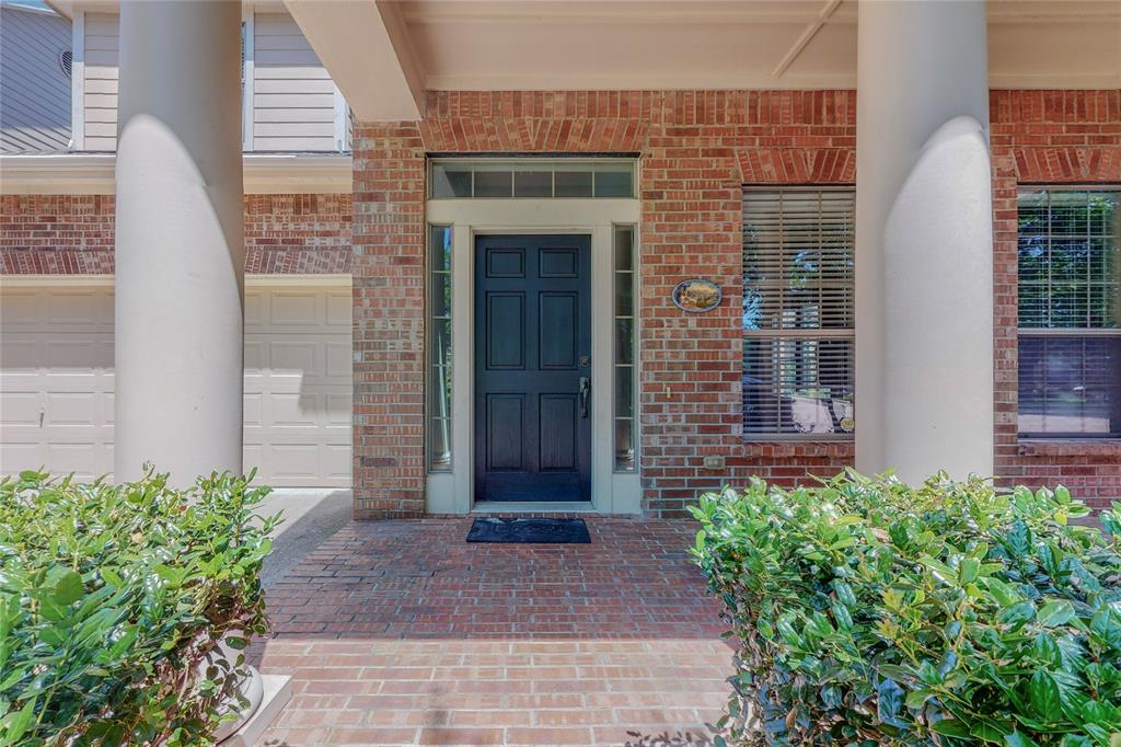 2855 Coteau Way Dallas, TX 75227 - Photo 3 of 35 a front view of a house with a yard