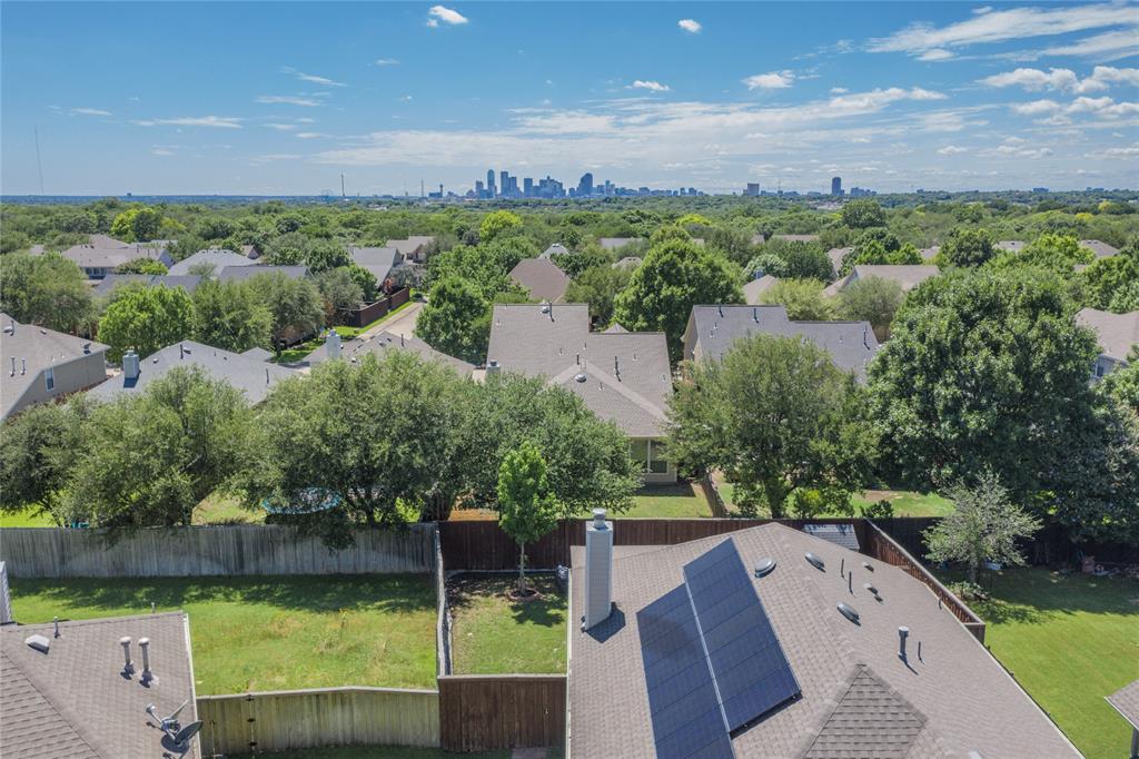 2855 Coteau Way Dallas, TX 75227 - Photo 32 of 35 an aerial view of a house with garden space and outdoor seating