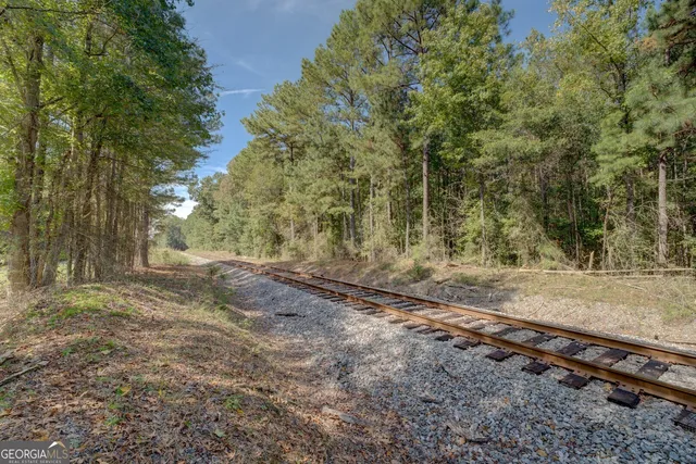 a view of a room with wooden walls