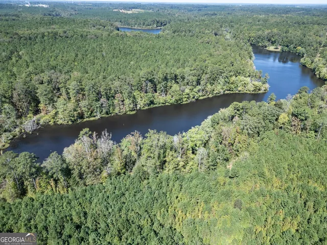 an aerial view of residential house with outdoor space