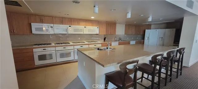 a view of a workspace with a window and sitting area