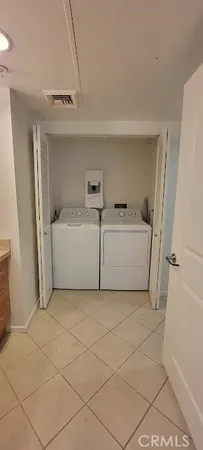a utility room with a washer and dryer
