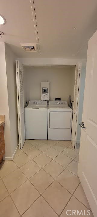 267 San Pedro Street Los Angeles, CA 90012 - Photo 7 of 24 a utility room with a washer and dryer