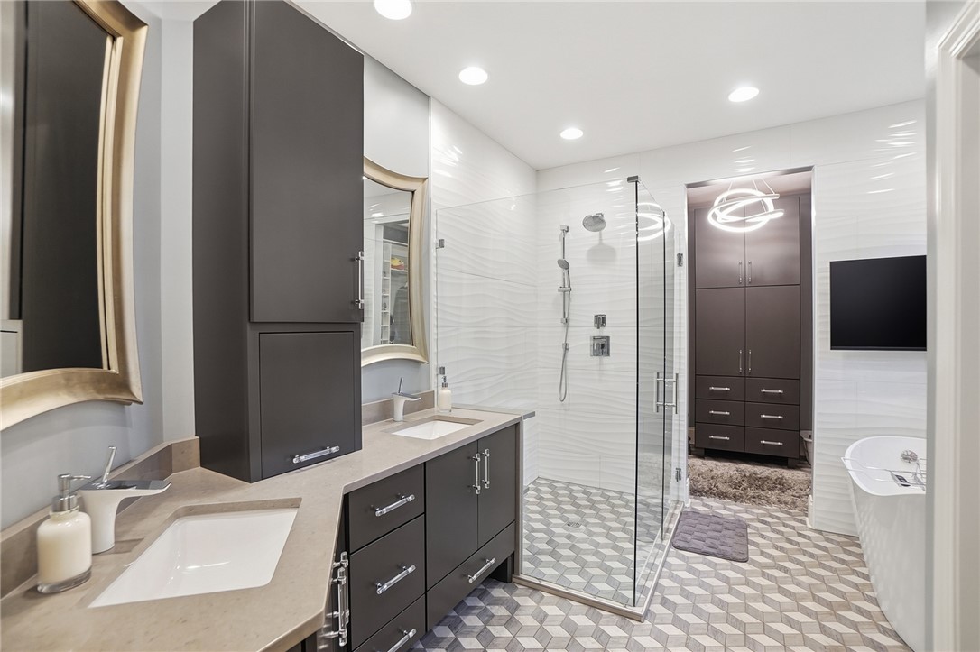 159 Rue Marseille Kettering, OH 45429 - Photo 17 of 52 This modern bathroom features clean lines and thoughtful design, creating a harmonious and functional space.