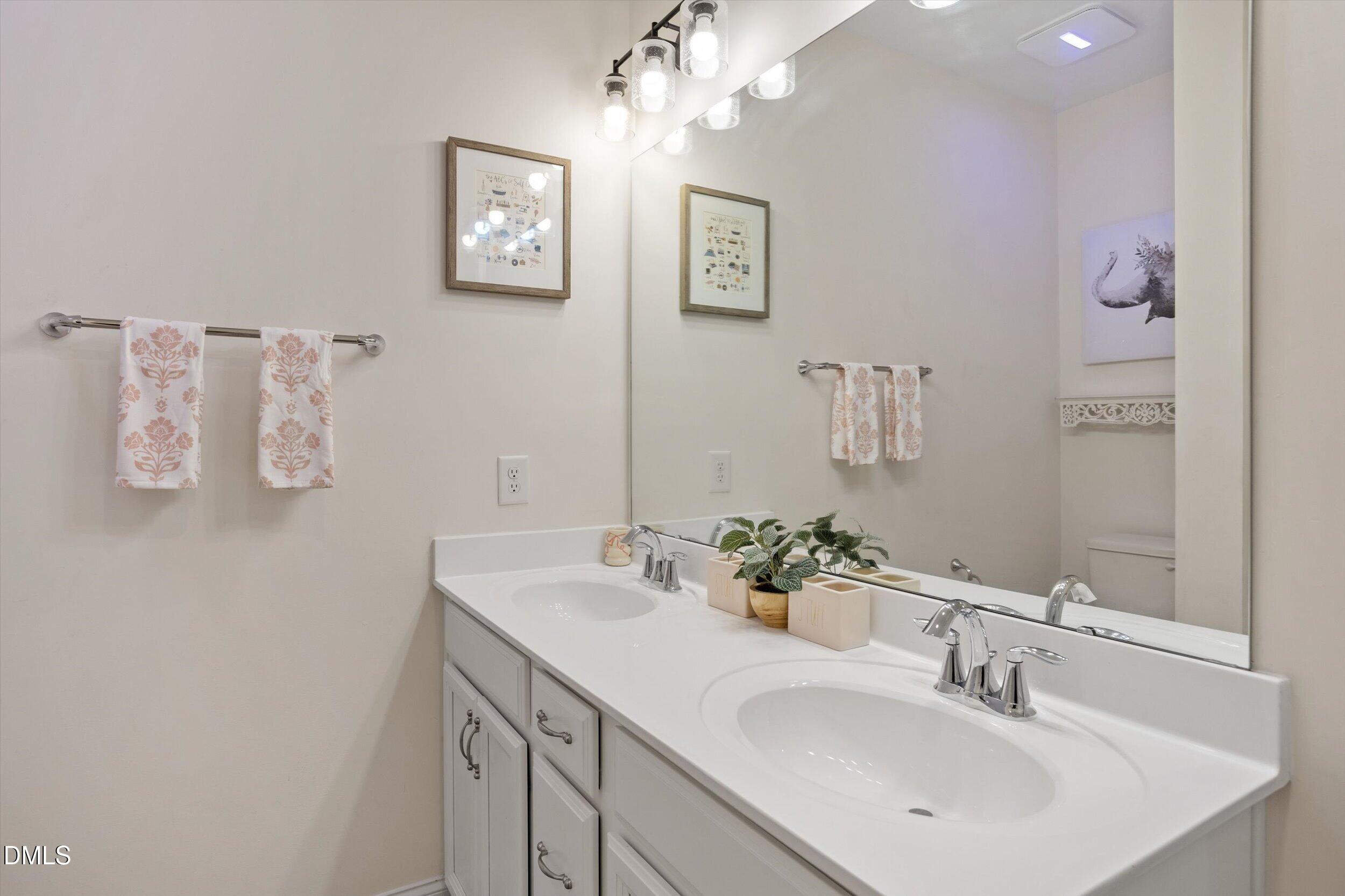 113 Raccoon Path Holly Springs, NC 27540 - Photo 26 of 28 113 Raccoon Path Guest Bath