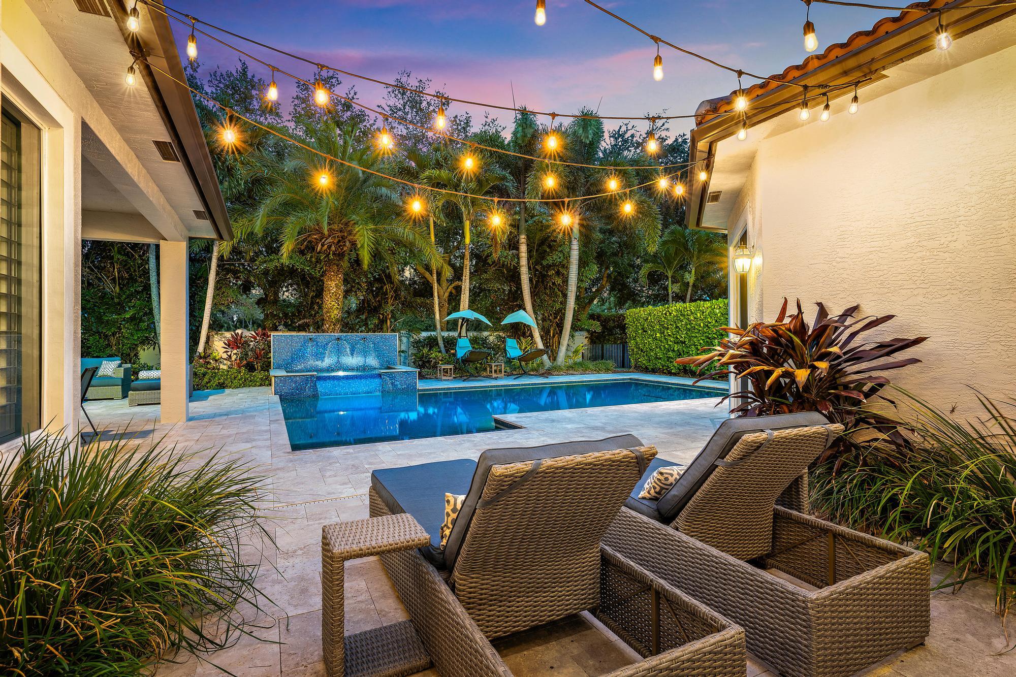 283 Rudder Cay Way Jupiter, FL 33458 - Photo 13 of 41 a view of a patio with couches table and chairs