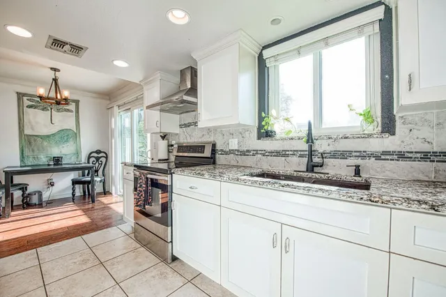 a view of a yard with a tree