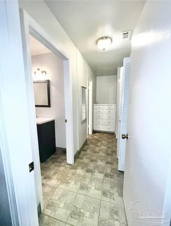 a bathroom with a toilet a sink and a shower