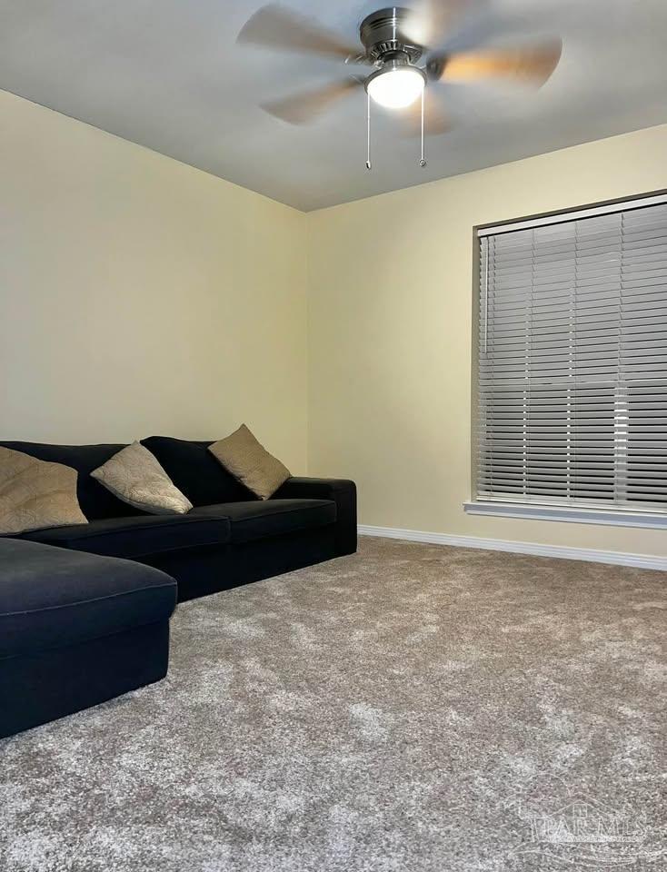 5705 Admiral Doyle Road Pensacola, FL 32506 - Photo 14 of 32 a black and white bed in a room