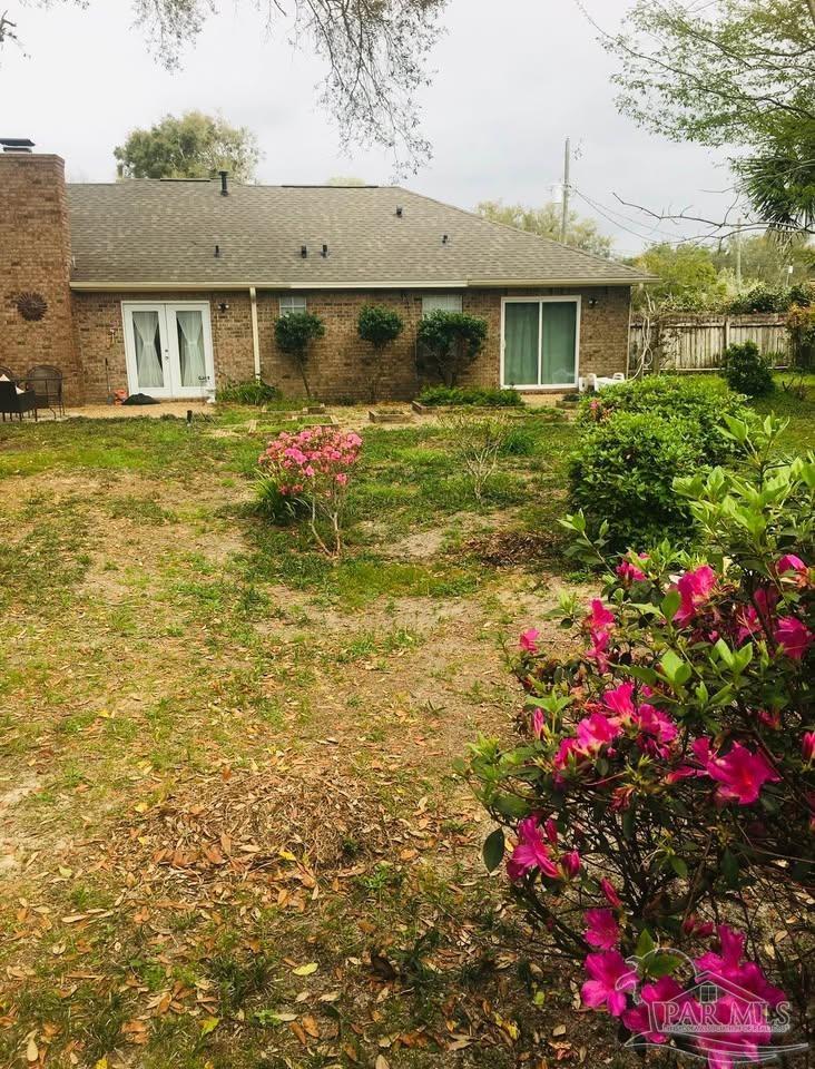 5705 Admiral Doyle Road Pensacola, FL 32506 - Photo 25 of 32 a front view of house with yard