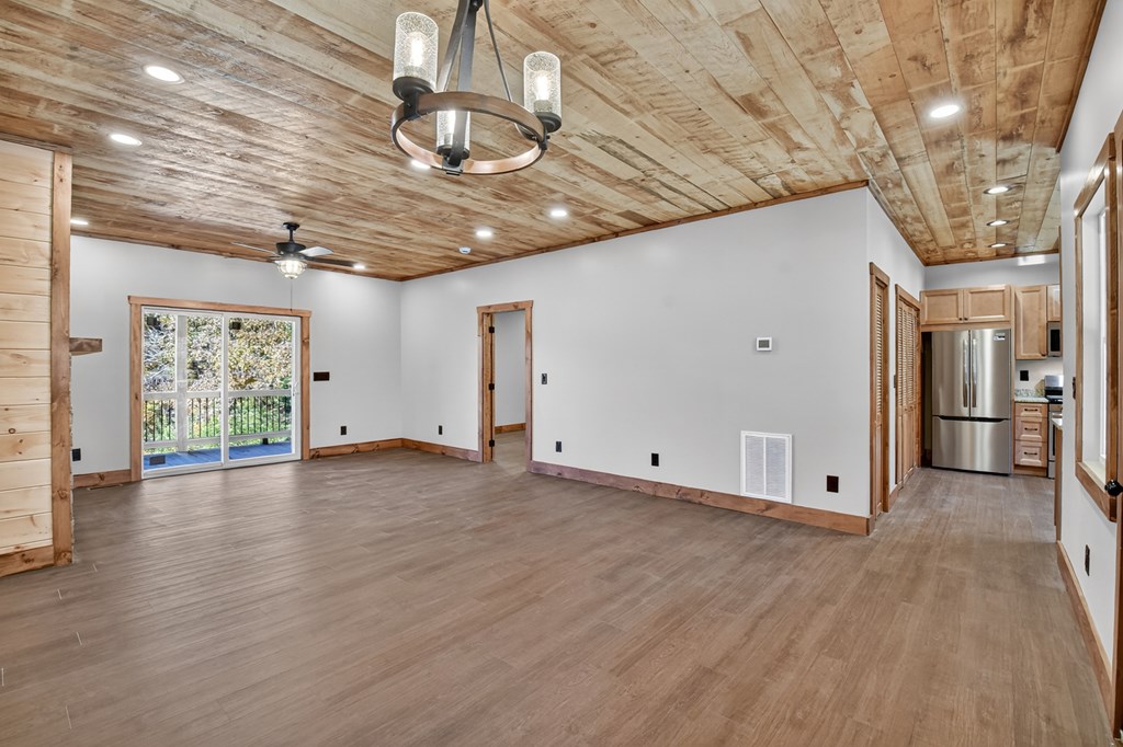 524 Old Highway Blue Ridge, GA 30513 - Photo 12 of 34 a view of empty room with wooden floor
