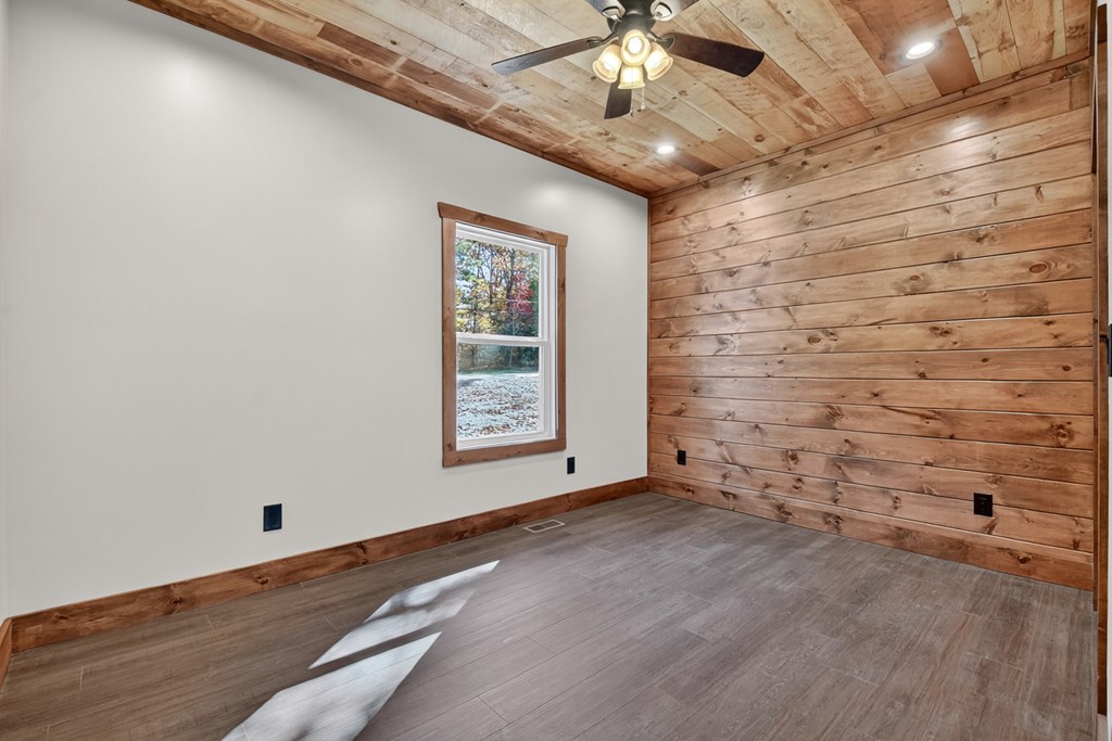 524 Old Highway Blue Ridge, GA 30513 - Photo 16 of 34 a view of an empty room with a window