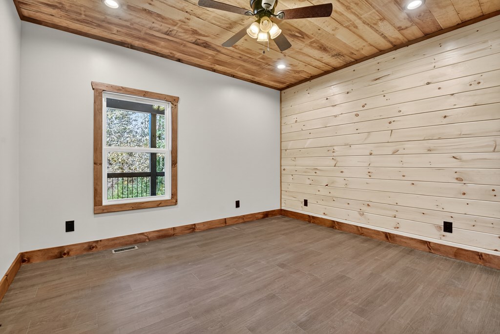 524 Old Highway Blue Ridge, GA 30513 - Photo 19 of 34 a view of an empty room with a window