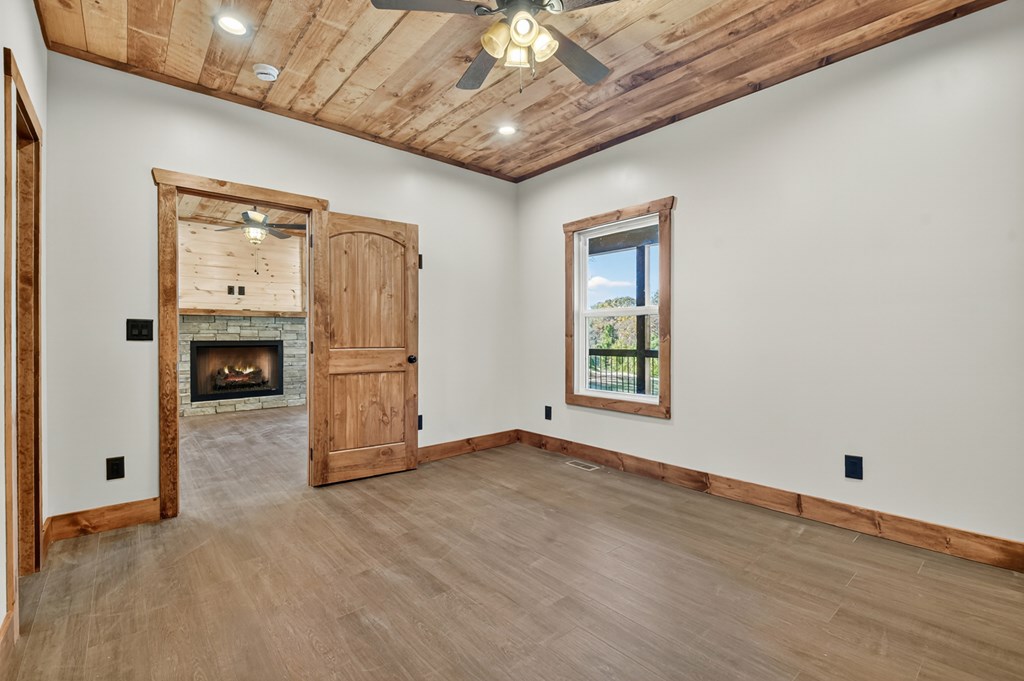 524 Old Highway Blue Ridge, GA 30513 - Photo 20 of 34 a view of livingroom with hardwood floor and ceiling fan