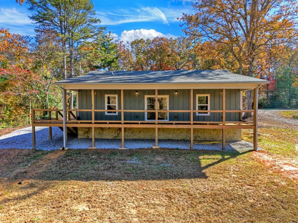 524 Old Highway Blue Ridge, GA 30513 - Photo 23 of 34 a view of a house with a yard