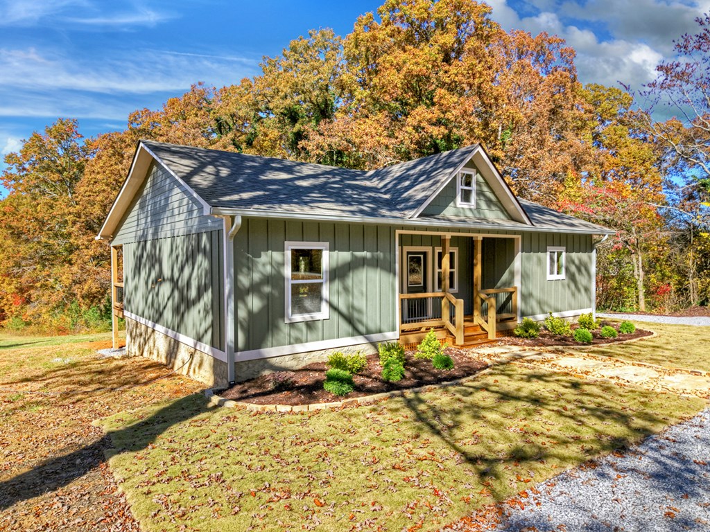 524 Old Highway Blue Ridge, GA 30513 - Photo 29 of 34 a front view of a house with garden
