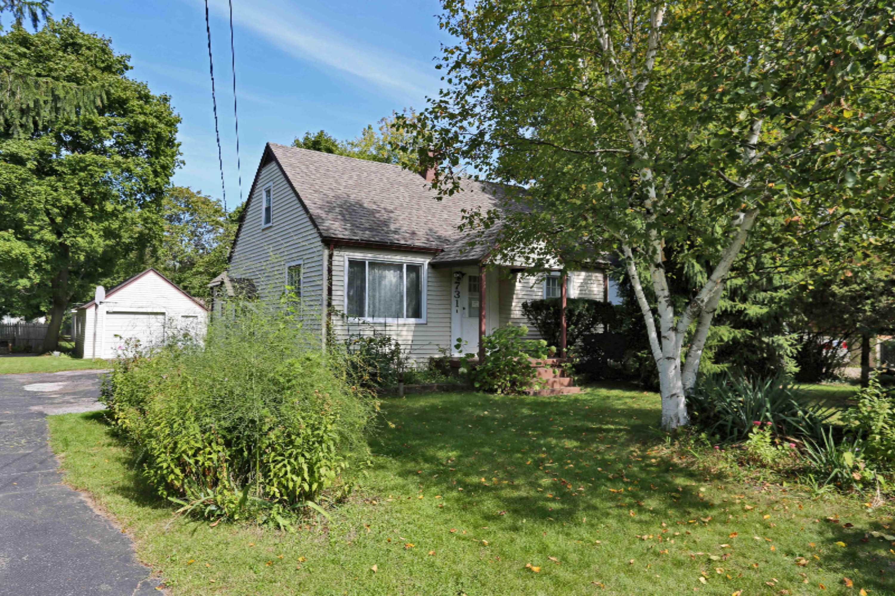 731 4 Mile Road Northeast Grand Rapids, MI 49525 - Photo 1 of 16 IMGL0005