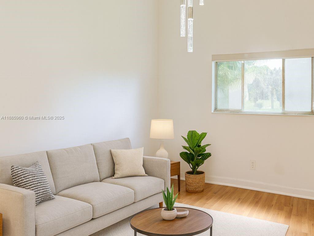 8662 Bridle Path Court, Unit 115A Davie, FL 33328 - Photo 12 of 50 a living room with furniture