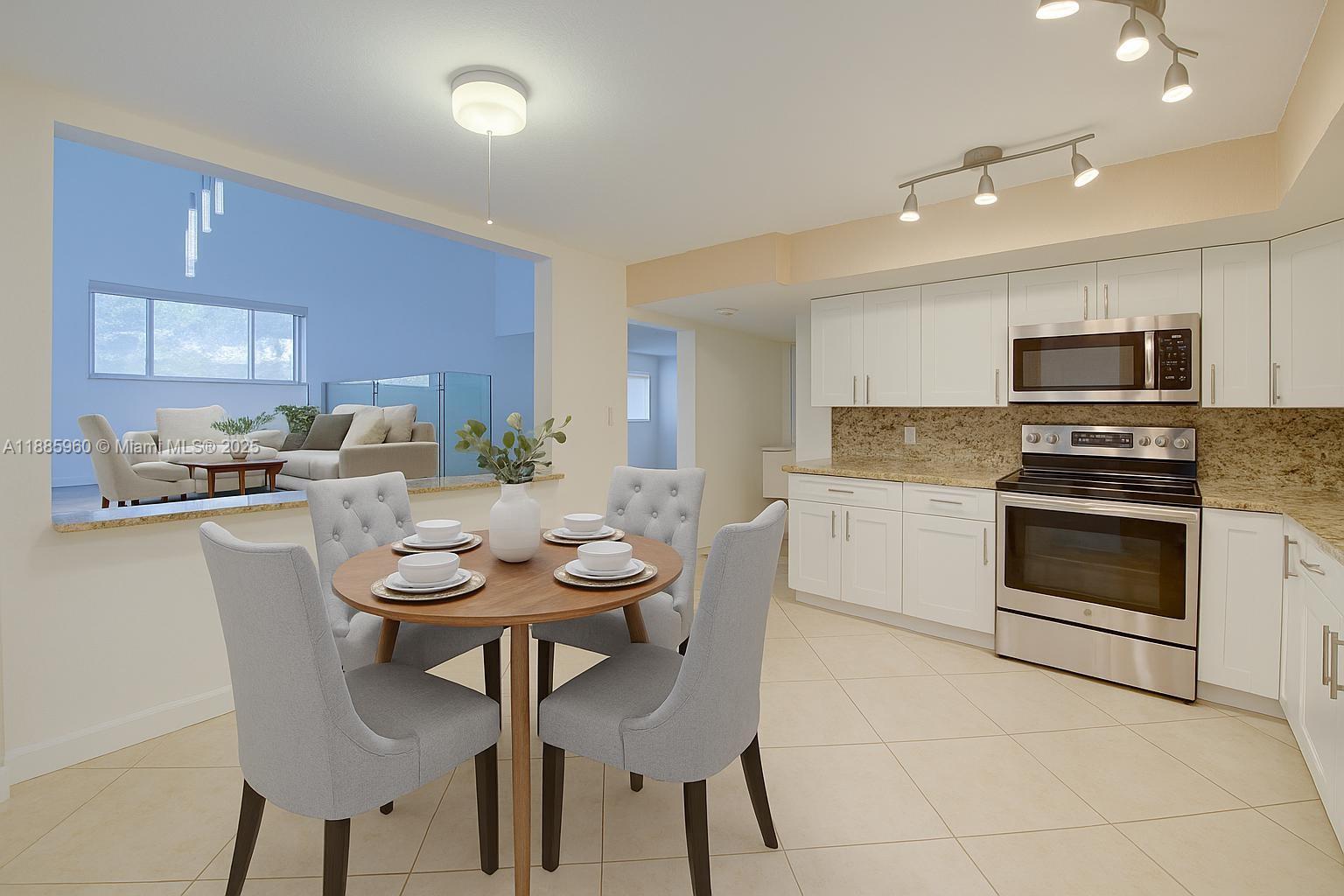 8662 Bridle Path Court, Unit 115A Davie, FL 33328 - Photo 16 of 50 a kitchen with a sink cabinets and stainless steel appliances