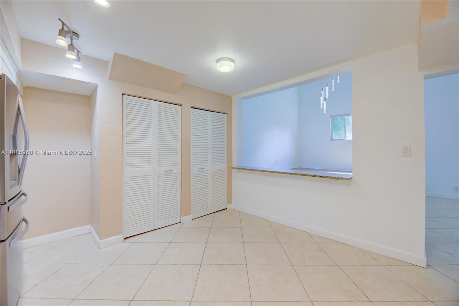 8662 Bridle Path Court, Unit 115A Davie, FL 33328 - Photo 21 of 50 a view of an empty room