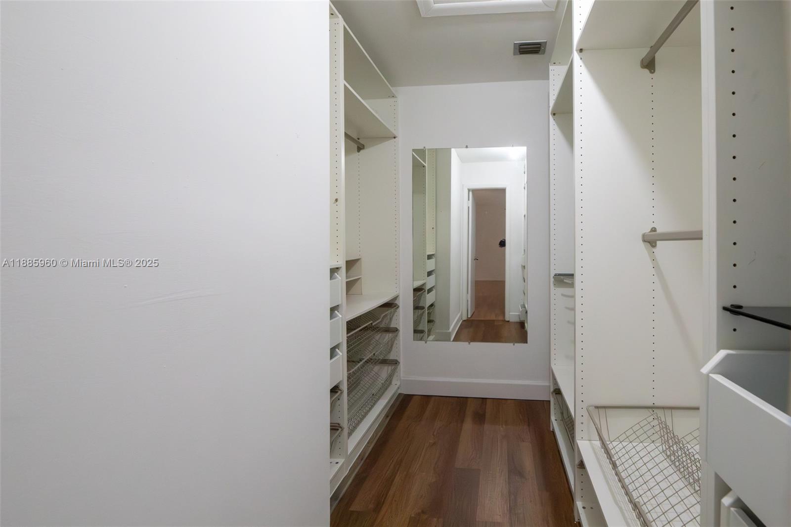 8662 Bridle Path Court, Unit 115A Davie, FL 33328 - Photo 28 of 50 a view of a hallway view with wooden floor and staircase