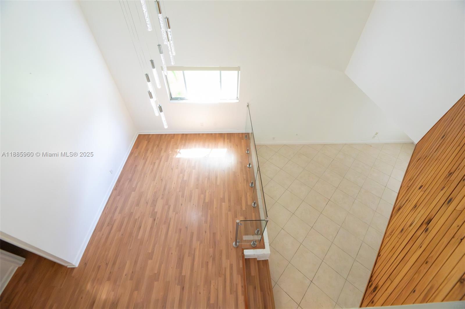 8662 Bridle Path Court, Unit 115A Davie, FL 33328 - Photo 30 of 50 a view of entryway with wooden floor