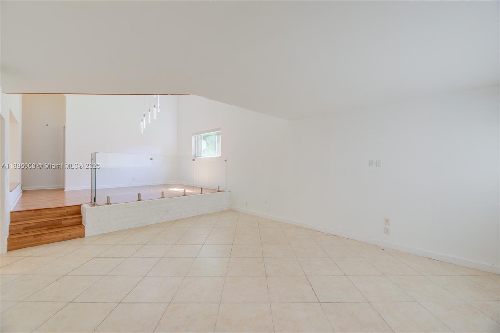 8662 Bridle Path Court, Unit 115A Davie, FL 33328 - Photo 9 of 50 a view of an empty room